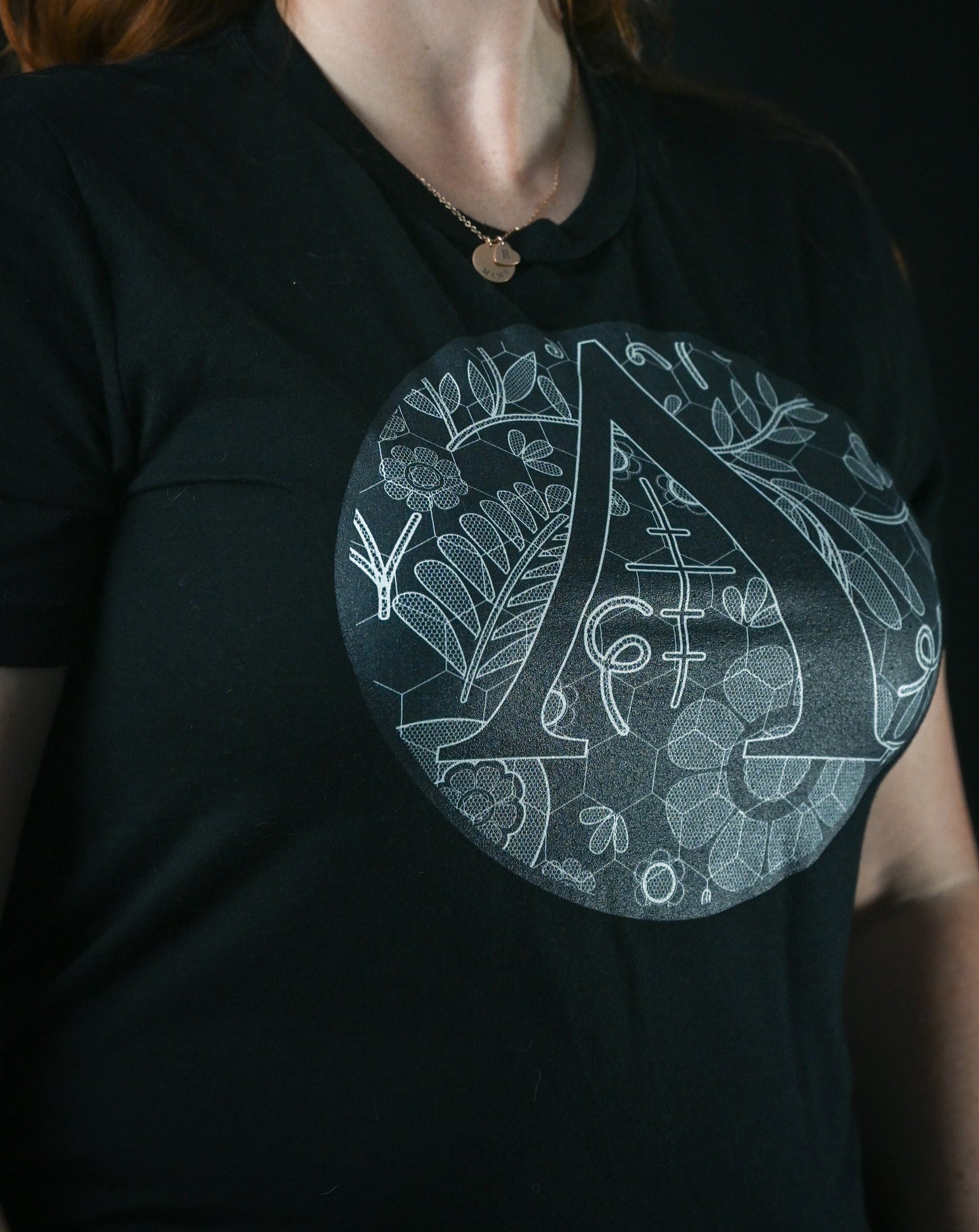 woman wearing logo tshirt